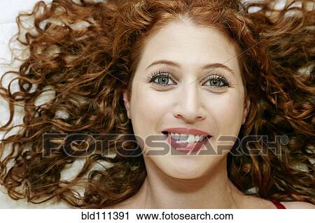 Stock Image - Caucasian woman smiling. Fotosearch