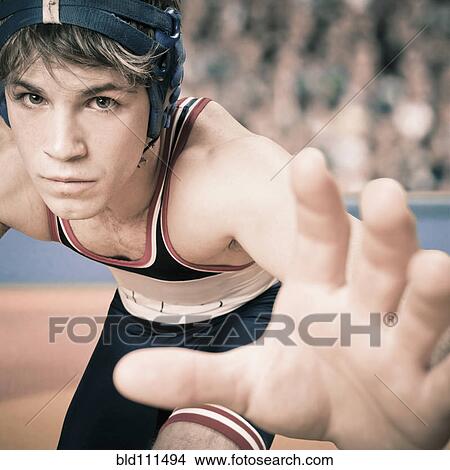 Picture - Caucasian wrestler in stance. Fotosearch