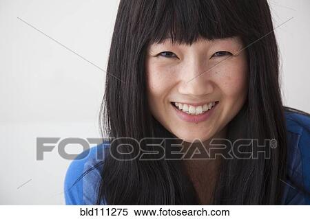 Stock Photography - Chinese woman smiling. Fotosearch