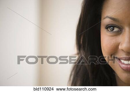 Picture - Close up of African American woman's face. Fotosearch