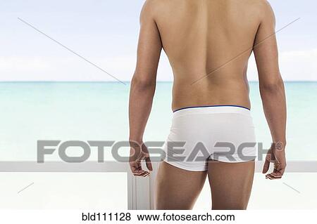 Hispanic man wearing white underwear View Large Photo Image Stock Photo - Hispanic man wearing white underwear. Fotosearch