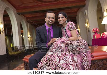 Stock Photo - Indian newlywed couple smiling. Fotosearch