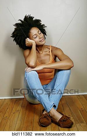 Stock Image - Mixed race woman smiling. Fotosearch