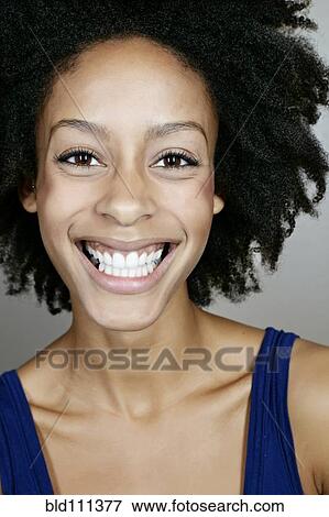 Stock Photo - Mixed race woman smiling. Fotosearch