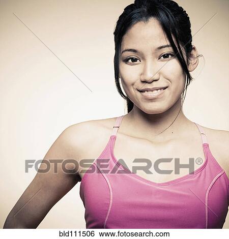 Stock Photograph - Mixed race woman smiling. Fotosearch