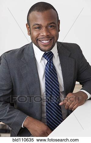 Smiling Black businessman View Large Photo Image Stock Photography - Smiling Black businessman. Fotosearch