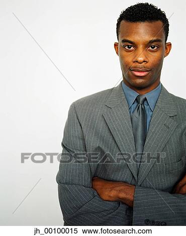 Portrait of a young businessman View Large Photo Image Stock Photography - Portrait of a young businessman. Fotosearch