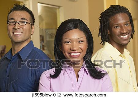 Businesspeople posing for the camera View Large Photo Image Stock Image - Businesspeople posing for the camera. Fotosearch