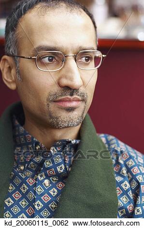Man wearing a scarf View Large Photo Image Stock Image - Man wearing a scarf. Fotosearch