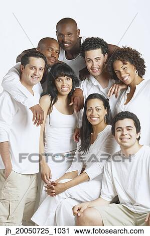 Friends smiling for the camera View Large Photo Image Stock Image - Friends smiling for the camera. Fotosearch