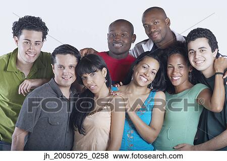 Friends smiling for the camera View Large Photo Image Stock Photo - Friends smiling for the camera. Fotosearch