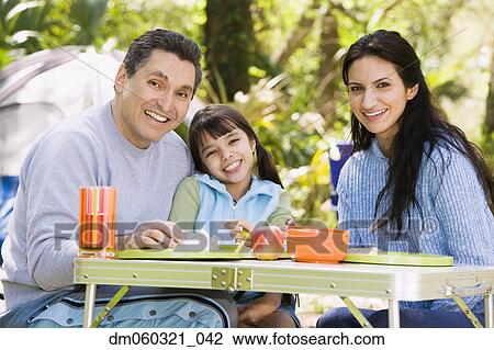 Hispanic family camping View Large Photo Image Stock Image - Hispanic family camping. Fotosearch