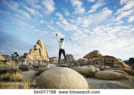 Black runner in desert landscape, Joshua Tree National Park, California, United States View Large Photo Image Stock Photo - Black runner in desert landscape, Joshua Tree National Park, California, United States. Fotosearch