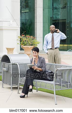 Business people working outdoors View Large Photo Image Stock Image - Business people working outdoors. Fotosearch