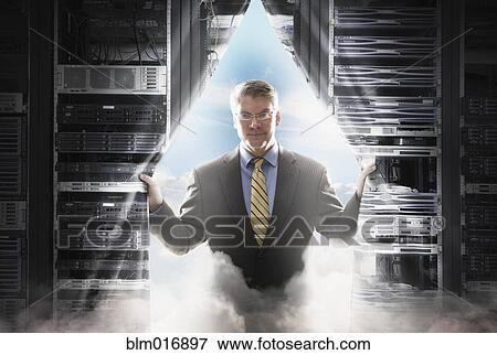 Stock Photo - Caucasian businessman pulling back curtain to clouds. Fotosearch