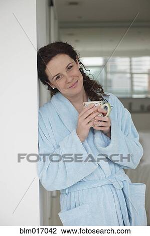 Caucasian woman having cup of coffee View Large Photo Image Stock Image - Caucasian woman having cup of coffee. Fotosearch