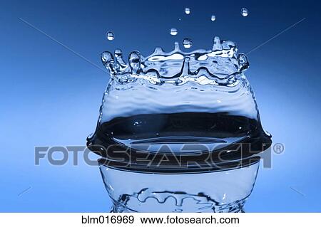 Stock Photo - Close up of water droplet splashing. Fotosearch