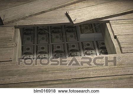 Dollar bills hidden under floorboards View Large Photo Image Stock Photo - Dollar bills hidden under floorboards. Fotosearch