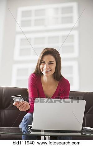 Caucasian woman shopping online View Large Photo Image Stock Image - Caucasian woman shopping online. Fotosearch