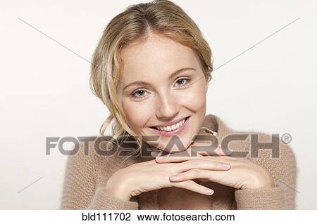 Stock Image - Caucasian woman smiling. Fotosearch