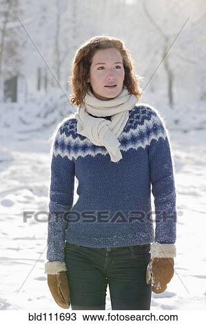 Caucasian woman standing in snow View Large Photo Image Stock Image - Caucasian woman standing in snow. Fotosearch