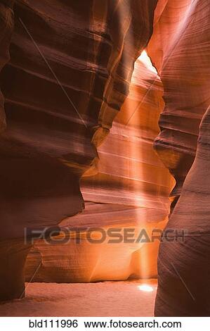 Light streaming through rock formations, Antelope Canyon, Arizona, United States View Large Photo Image Stock Photograph - Light streaming through rock formations, Antelope Canyon, Arizona, United States. Fotosearch