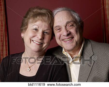 Older couple smiling together View Large Photo Image Stock Photo - Older couple smiling together. Fotosearch