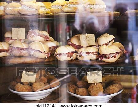 Sandwiches and croquettes for sale in window View Large Photo Image Stock Image - Sandwiches and croquettes for sale in window. Fotosearch