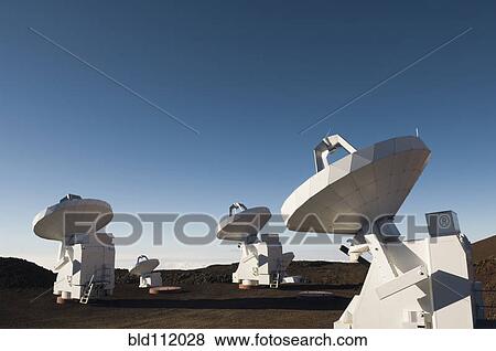 Satellites pointed towards sky View Large Photo Image Stock Photo - Satellites pointed towards sky. Fotosearch