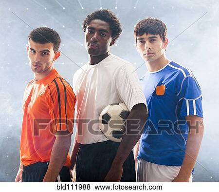 Soccer players standing together View Large Photo Image Stock Photo - Soccer players standing together. Fotosearch