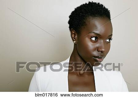 Stock Photograph - African American woman smiling. Fotosearch