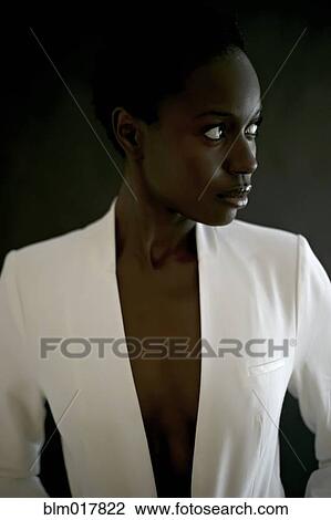 African American woman wearing white jacket View Large Photo Image Stock Image - African American woman wearing white jacket. Fotosearch