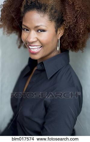 Picture - Black businesswoman smiling. Fotosearch