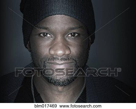 Stock Photo - Black man smiling. Fotosearch