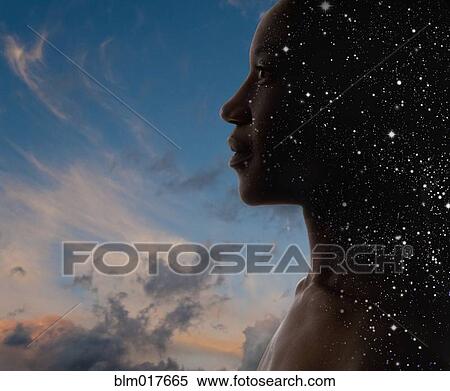 Black woman's face superimposed over sky View Large Photo Image Stock Photography - Black woman's face superimposed over sky. Fotosearch