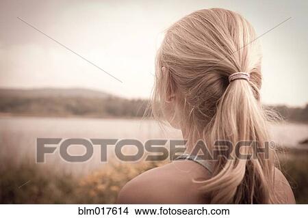 Caucasian girl overlooking rural landscape View Large Photo Image Picture - Caucasian girl overlooking rural landscape. Fotosearch