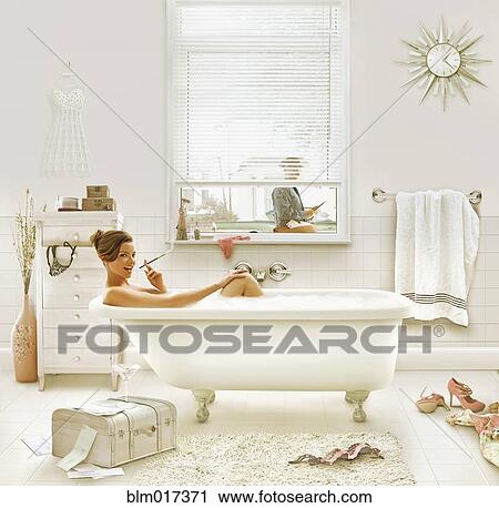 Caucasian woman smoking in bath View Large Photo Image Stock Image - Caucasian woman smoking in bath. Fotosearch