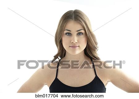 Picture - Caucasian woman with hands on hips. Fotosearch