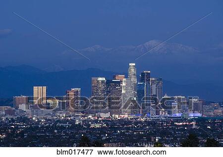 Stock Photo - City skyline lit up at night, Los Angeles, California, United States. Fotosearch