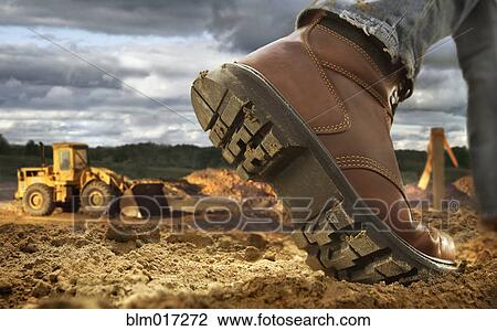 Close up of worker's boot on construction site View Large Photo Image Stock Image - Close up of worker's boot on construction site. Fotosearch