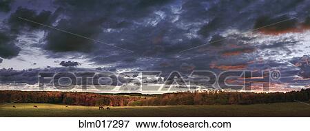 Dramatic sky over rural landscape View Large Photo Image Stock Photo - Dramatic sky over rural landscape. Fotosearch
