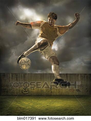 Illustration of soccer player kicking ball in field View Large Photo Image Stock Image - Illustration of soccer player kicking ball in field . Fotosearch