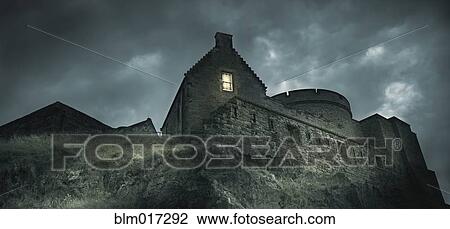 Low angle view of castle on rocky hill View Large Photo Image Stock Image - Low angle view of castle on rocky hill. Fotosearch