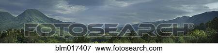 Mountains in rural landscape View Large Photo Image Stock Photo - Mountains in rural landscape. Fotosearch