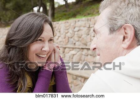Older Caucasian couple smiling outdoors View Large Photo Image Stock Image - Older Caucasian couple smiling outdoors. Fotosearch