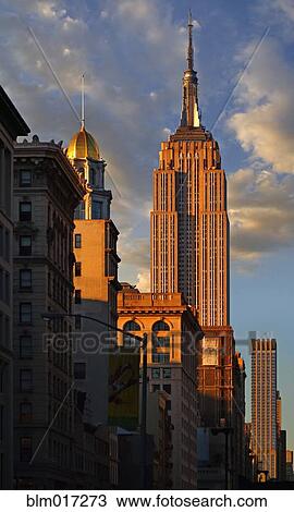 Stock Image - Skyscrapers and blue sky, New York, New York, United States. Fotosearch