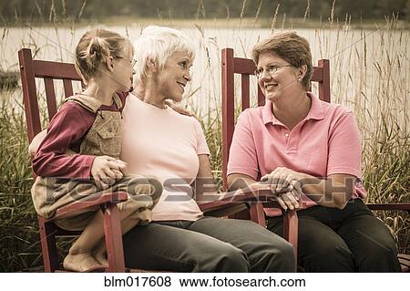 Three generations of Caucasian women smiling View Large Photo Image Stock Photo - Three generations of Caucasian women smiling. Fotosearch