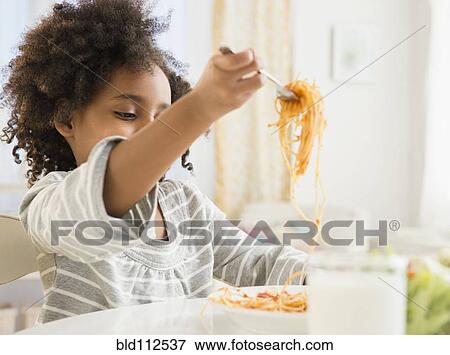 African American girl eating plate of spaghetti View Large Photo Image Stock Photo - African American girl eating plate of spaghetti. Fotosearch