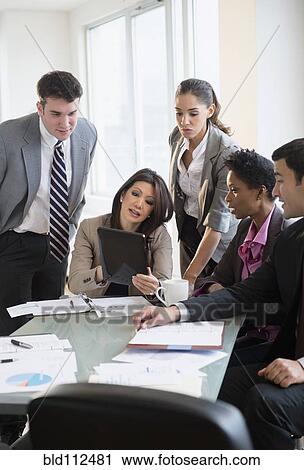 Business people talking in meeting View Large Photo Image Stock Image - Business people talking in meeting. Fotosearch