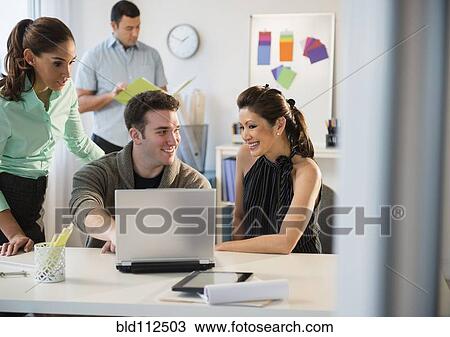 Business people talking in office View Large Photo Image Stock Image - Business people talking in office. Fotosearch